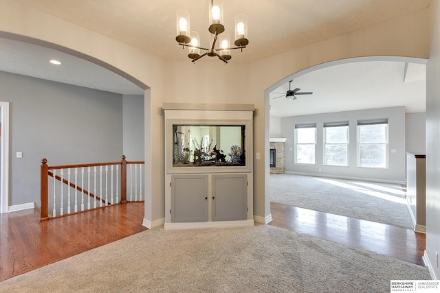 interior space featuring a notable chandelier and carpet