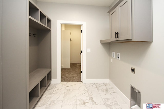 washroom featuring washer hookup, hookup for an electric dryer, and cabinets