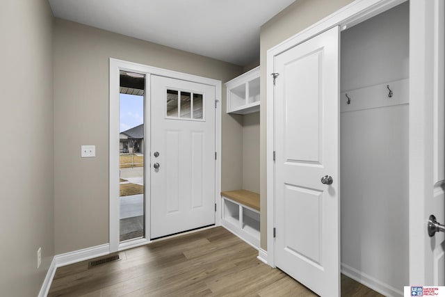 mudroom with hardwood / wood-style flooring