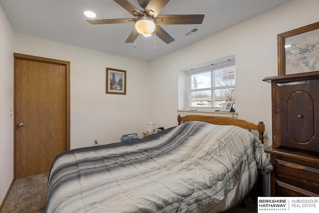 carpeted bedroom with ceiling fan