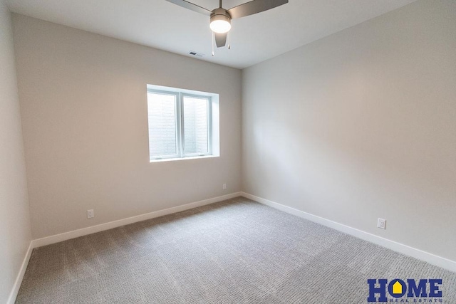 unfurnished room with carpet and ceiling fan