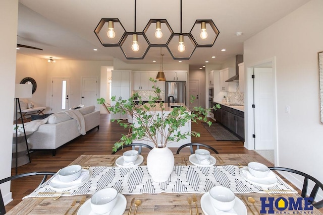 dining area with dark hardwood / wood-style floors