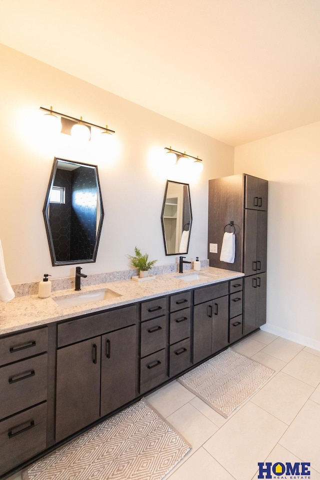 bathroom featuring vanity and tile patterned flooring