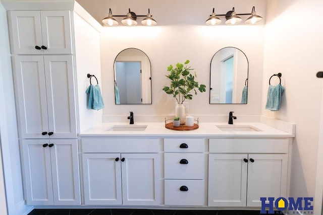 bathroom featuring vanity and tile patterned flooring