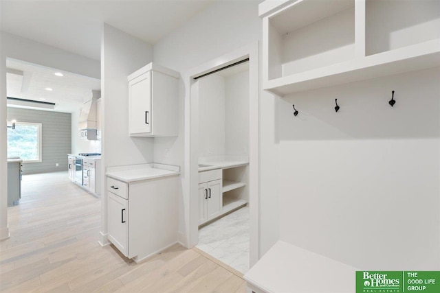 mudroom with light wood-type flooring