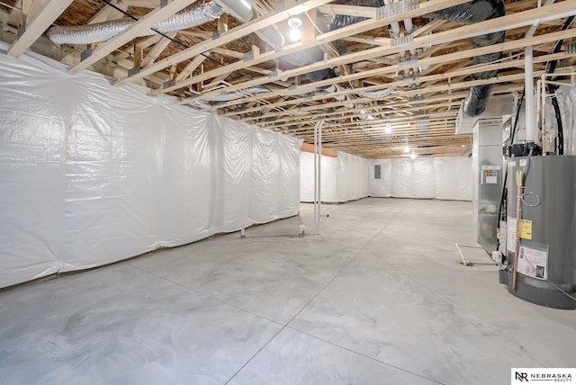 basement with water heater and heating unit