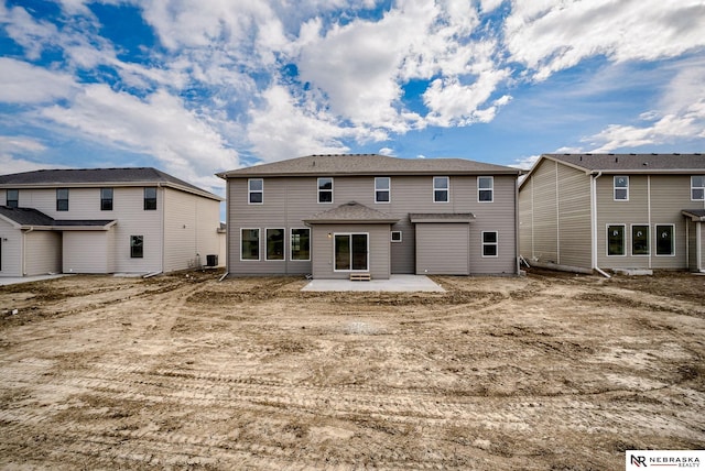 rear view of house featuring a patio area