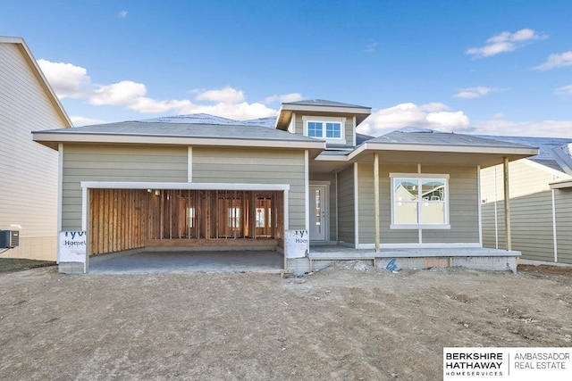 view of front of home with a garage