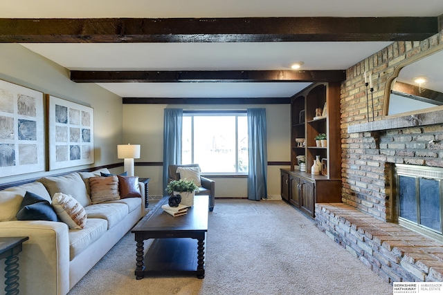 living room featuring light carpet, beamed ceiling, and a fireplace