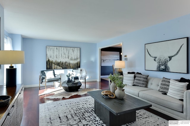 living room featuring dark wood-type flooring