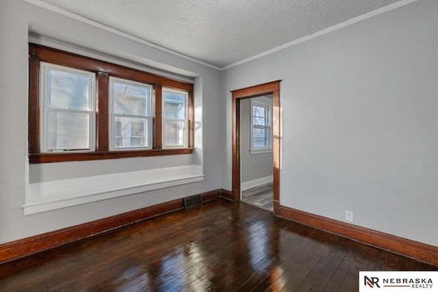 unfurnished room featuring crown molding, a textured ceiling, and dark hardwood / wood-style flooring