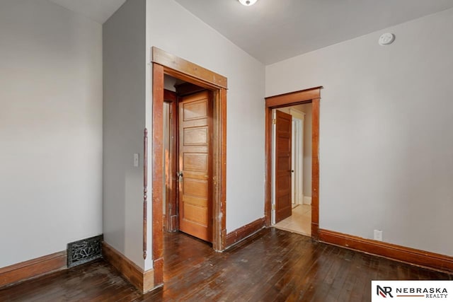 hall featuring dark hardwood / wood-style floors