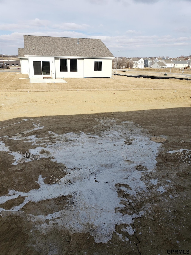 rear view of house with a patio area