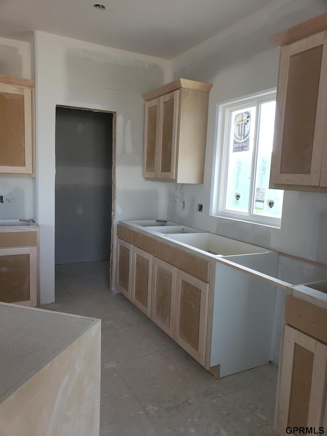 kitchen with light brown cabinets