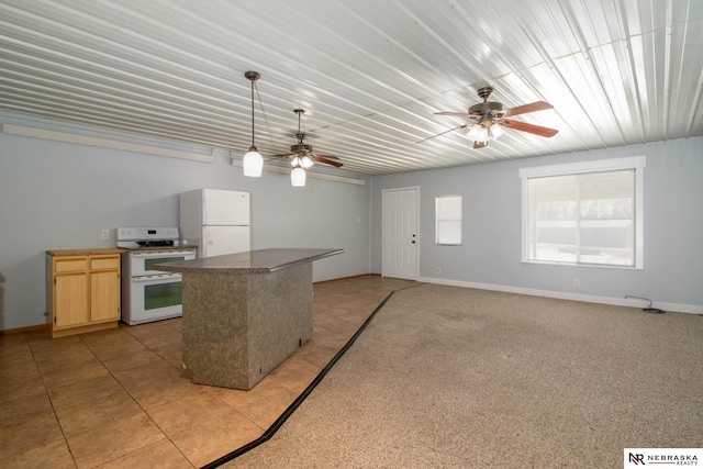 kitchen with light brown cabinets, pendant lighting, ceiling fan, light tile patterned flooring, and white appliances