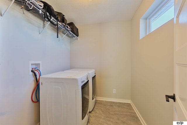 laundry area featuring independent washer and dryer