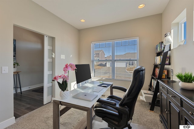 view of carpeted office space