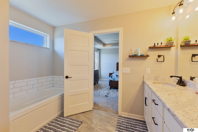 bathroom featuring vanity and a bathtub