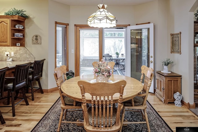 dining room featuring light hardwood / wood-style flooring