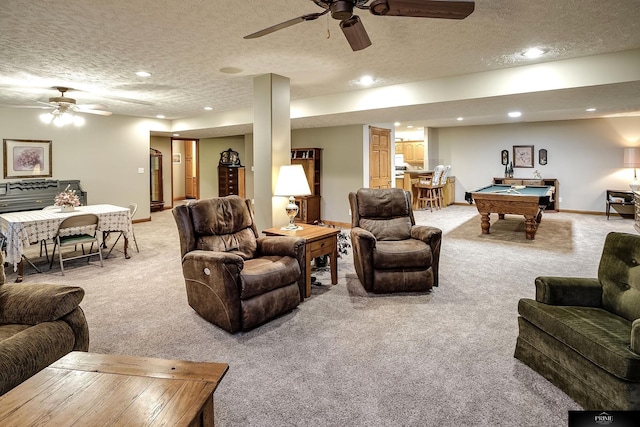 carpeted living room featuring a textured ceiling and billiards