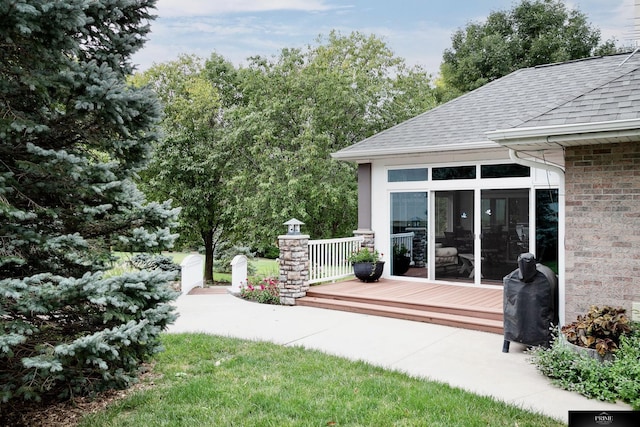 view of yard with a wooden deck