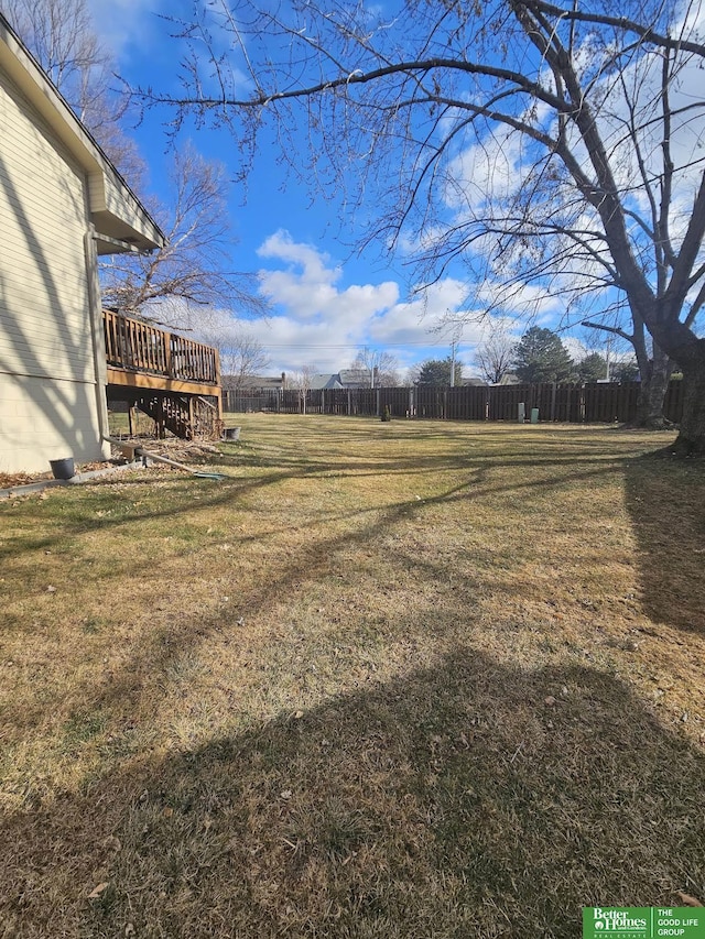 view of yard featuring a deck