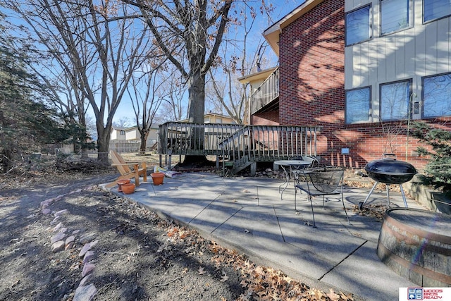 view of patio / terrace featuring area for grilling and a wooden deck