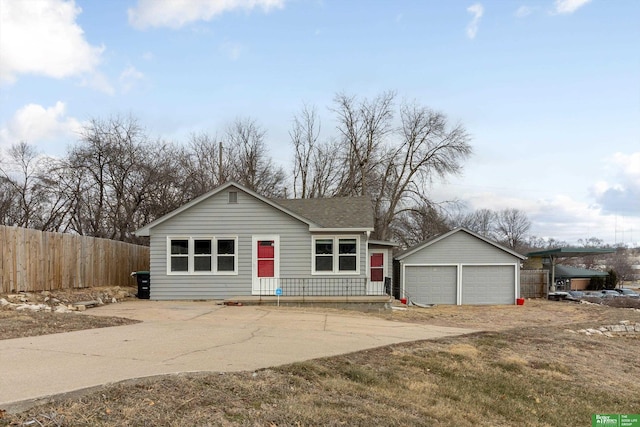 view of front of property featuring an outbuilding and a garage