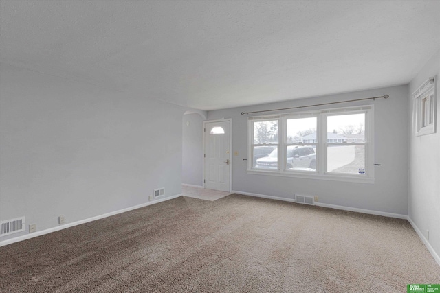 interior space featuring a textured ceiling