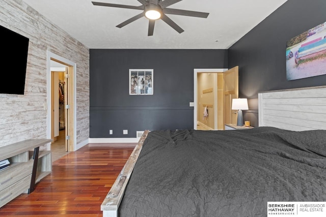 unfurnished bedroom featuring ceiling fan and dark hardwood / wood-style flooring