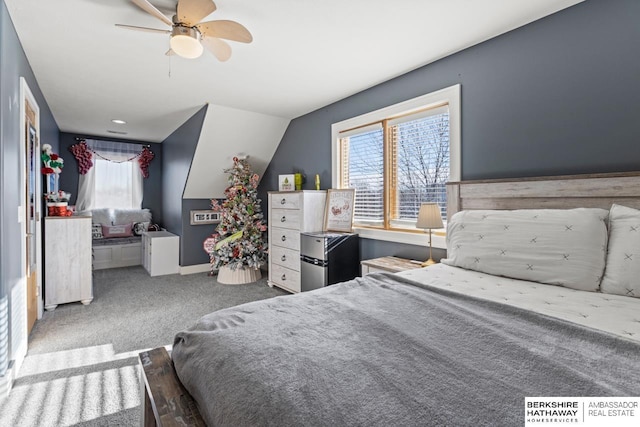 bedroom featuring ceiling fan, lofted ceiling, and carpet floors