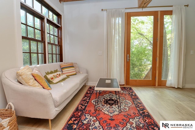 sitting room with hardwood / wood-style floors