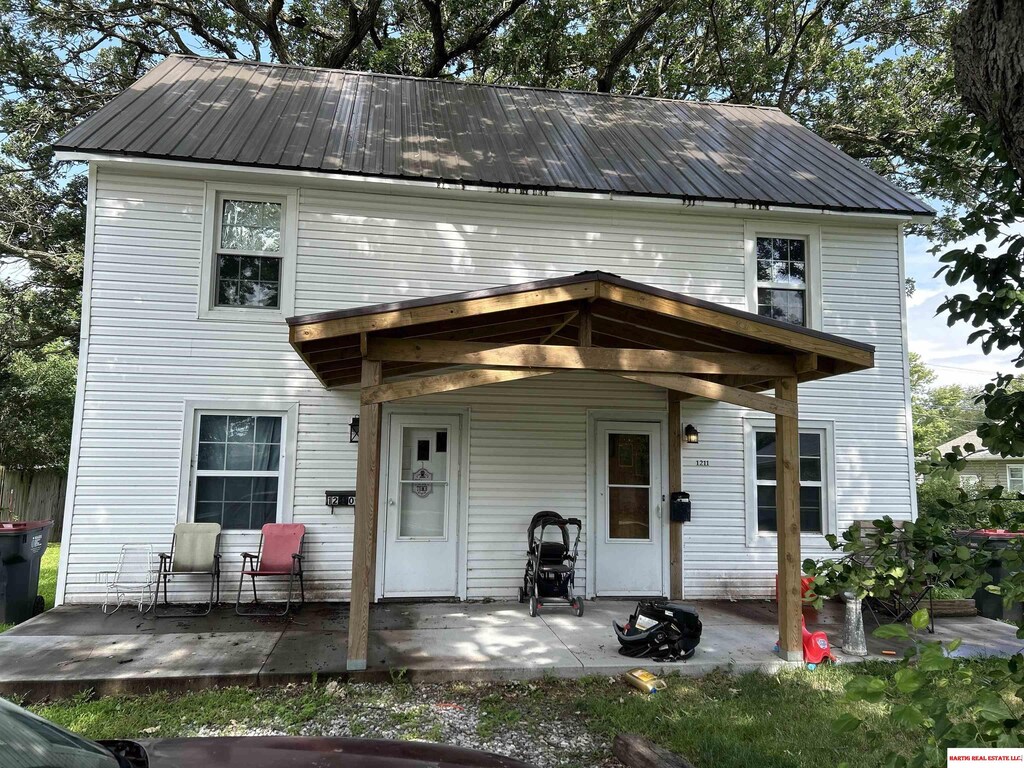 view of front of home with a patio