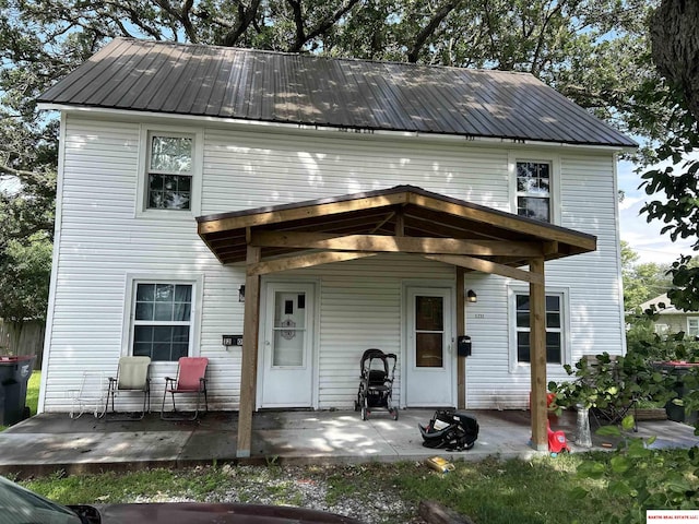 view of front of home with a patio