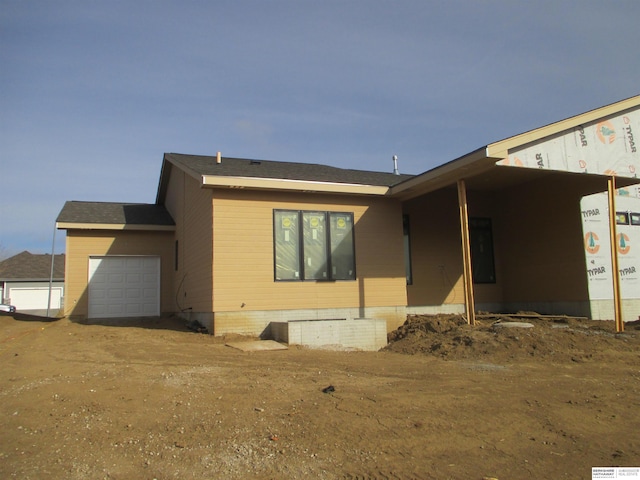 exterior space featuring a garage