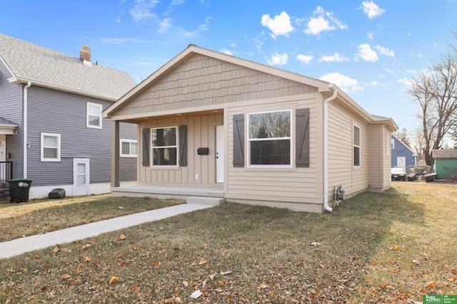 bungalow with a front yard