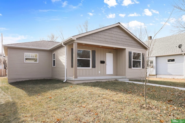 view of front of house with a front lawn