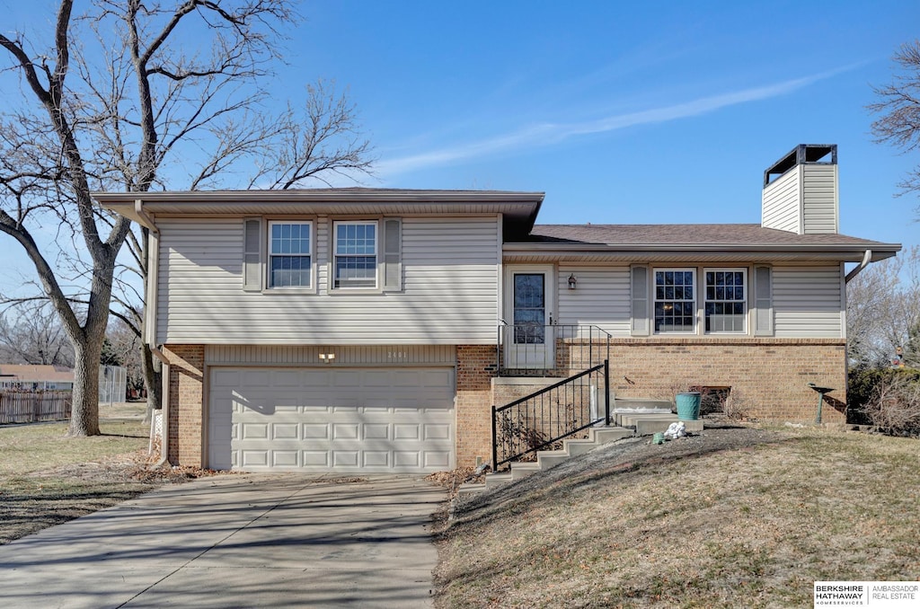 split level home with a garage