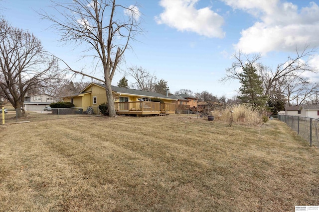 view of yard with a wooden deck