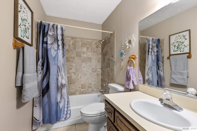 full bathroom with shower / tub combo, vanity, tile patterned flooring, and toilet