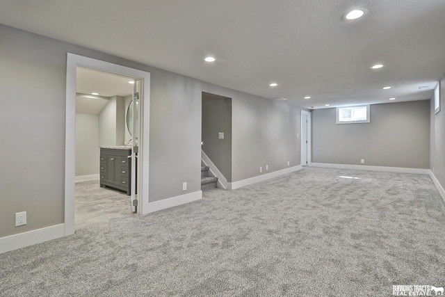 basement with light carpet