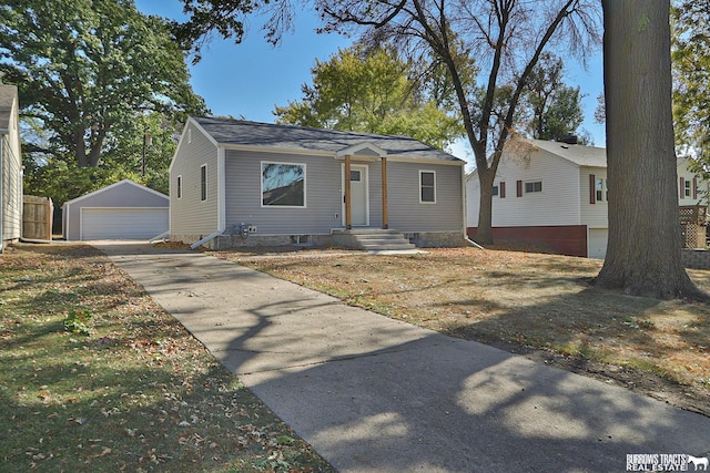 view of front of house featuring an outbuilding and a garage