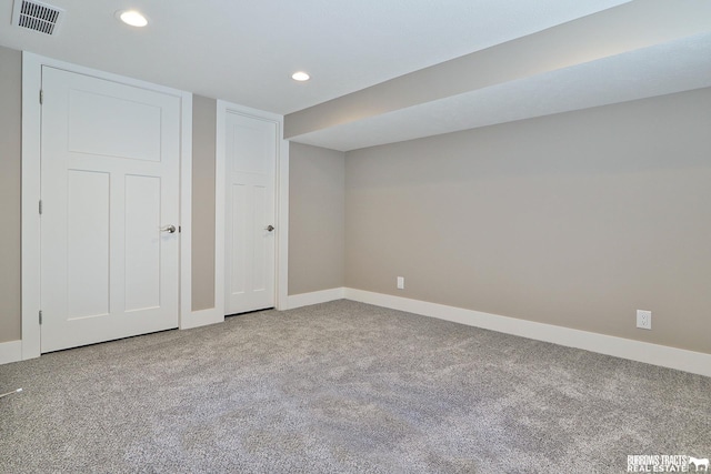 basement with carpet flooring