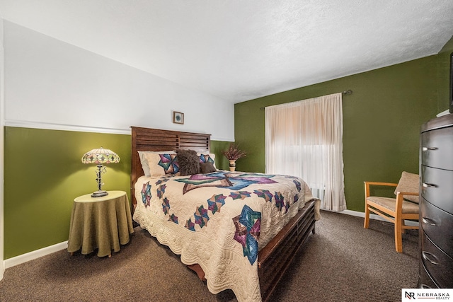 bedroom featuring carpet flooring and baseboards