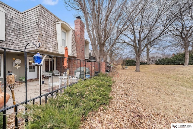 view of yard with a patio area