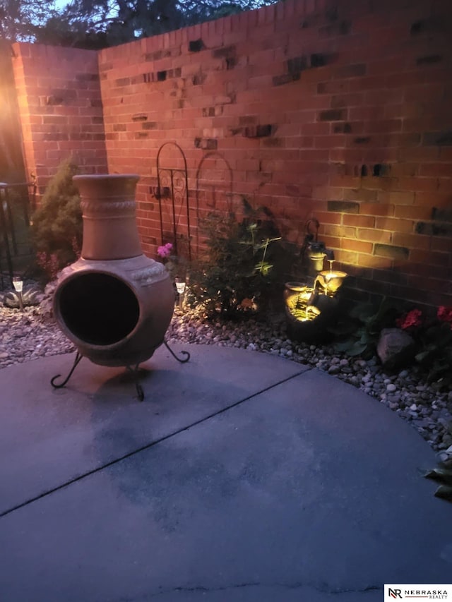 view of patio / terrace with fence