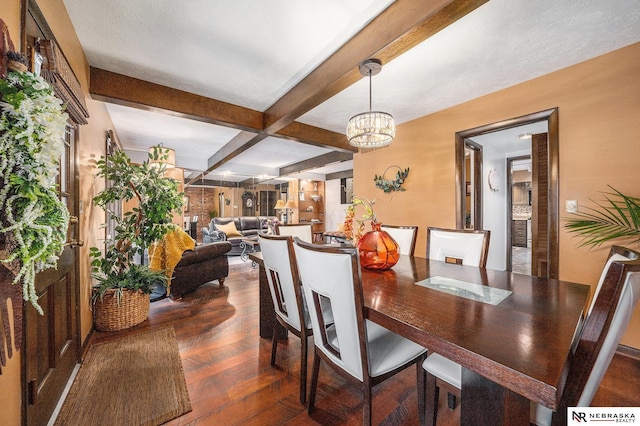 dining room featuring beamed ceiling, wood-type flooring, and a notable chandelier