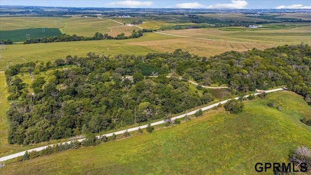 birds eye view of property featuring a rural view