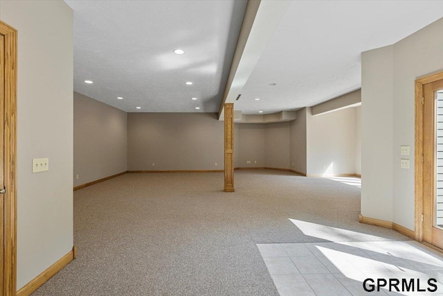 basement with light carpet