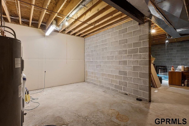 basement featuring electric water heater